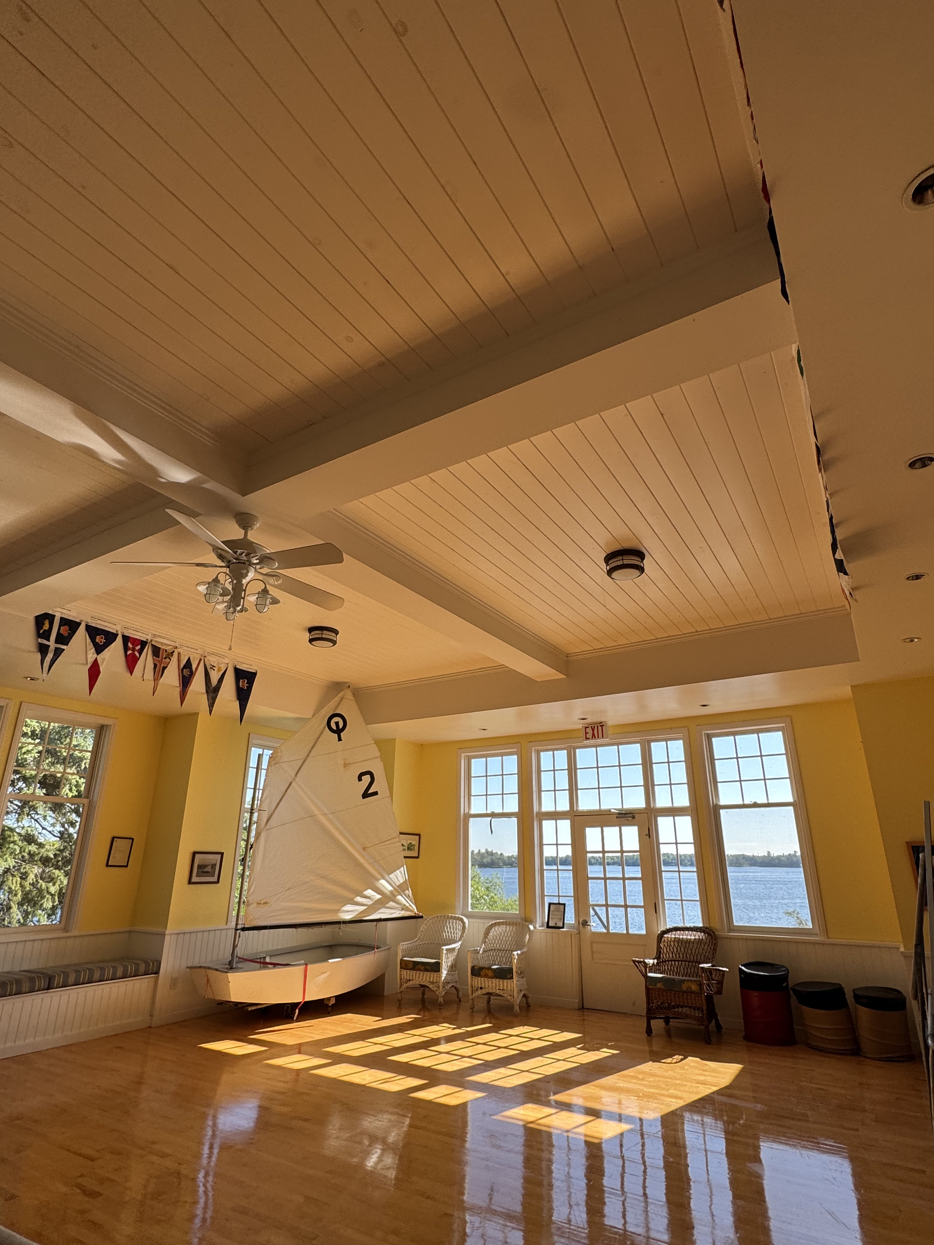 Sunlit camp interior with a Lake of the Woods view